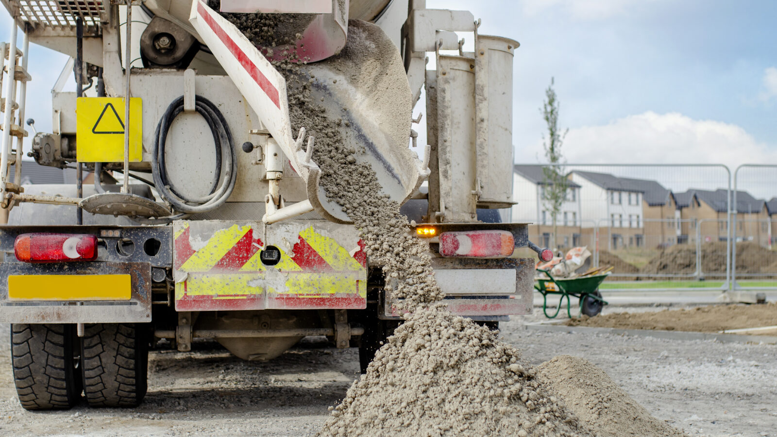 Concrete delivered to the construction site and discharged from the concrete mixing wagon truck
