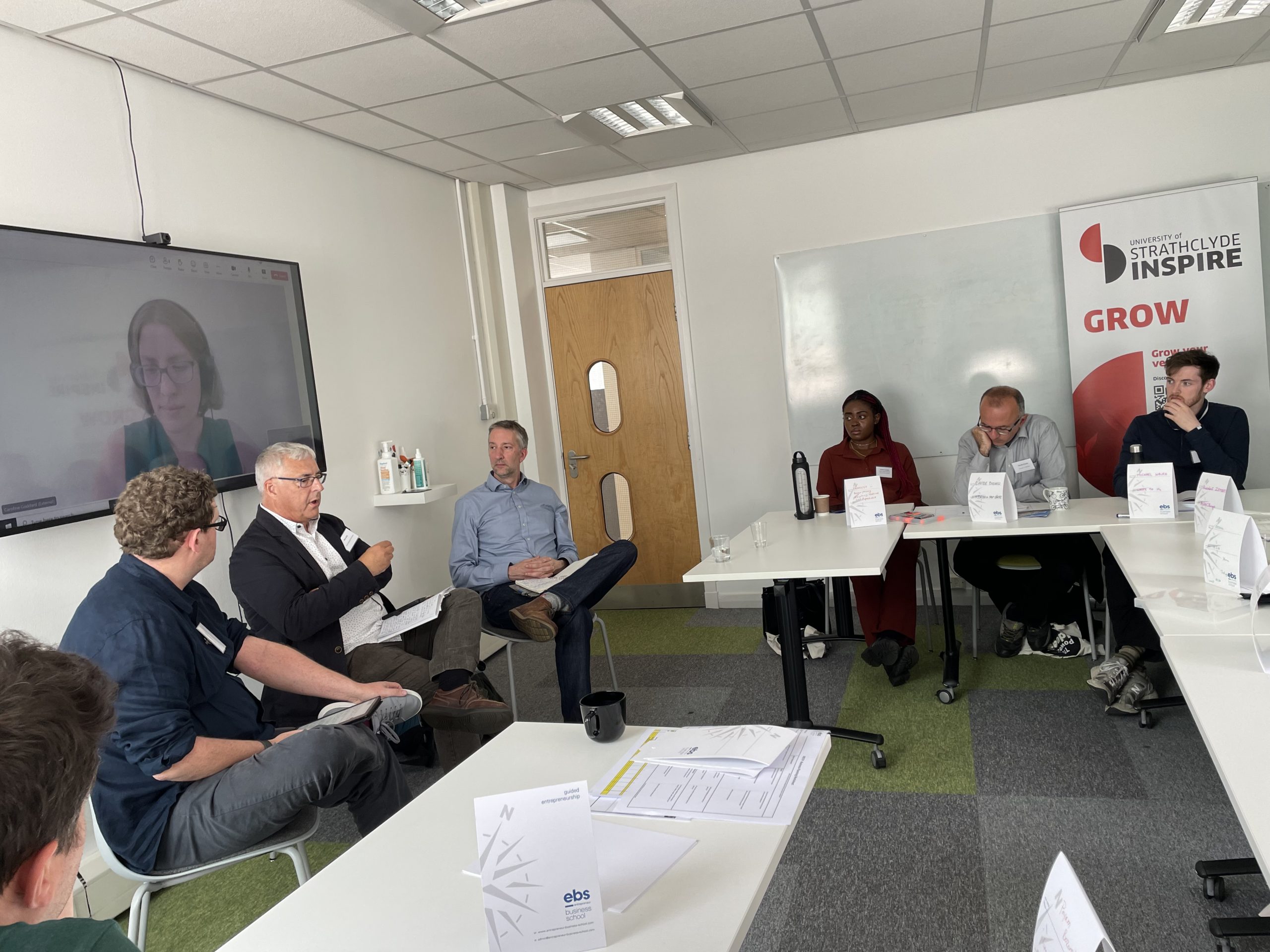 Image shows participants at the Converge Workshop, June 2025